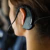 EVO cableless headset mic on fitness instructor as seen from behind
