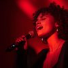 Woman_Singing_into_Mic_with_GF-200T Galaxy FLYTE -Woman Singing into XLR Mic Made Wireless with the GF-200
